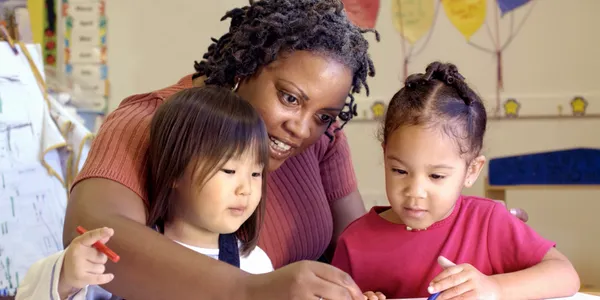image of teacher sharing learning opportunity with students