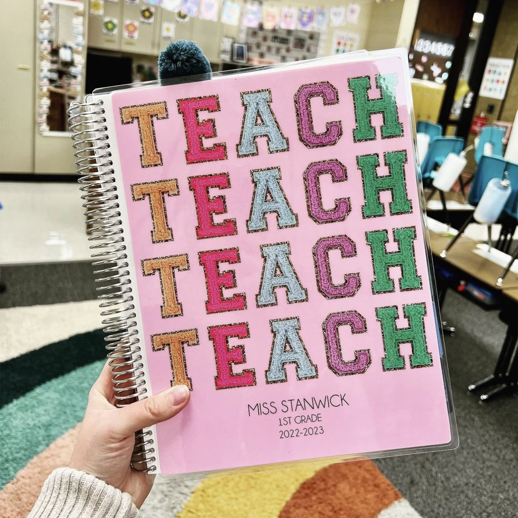 teacher with personalized teacher planner showing personalization