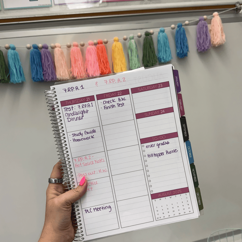 planner opened to a layout page with writing